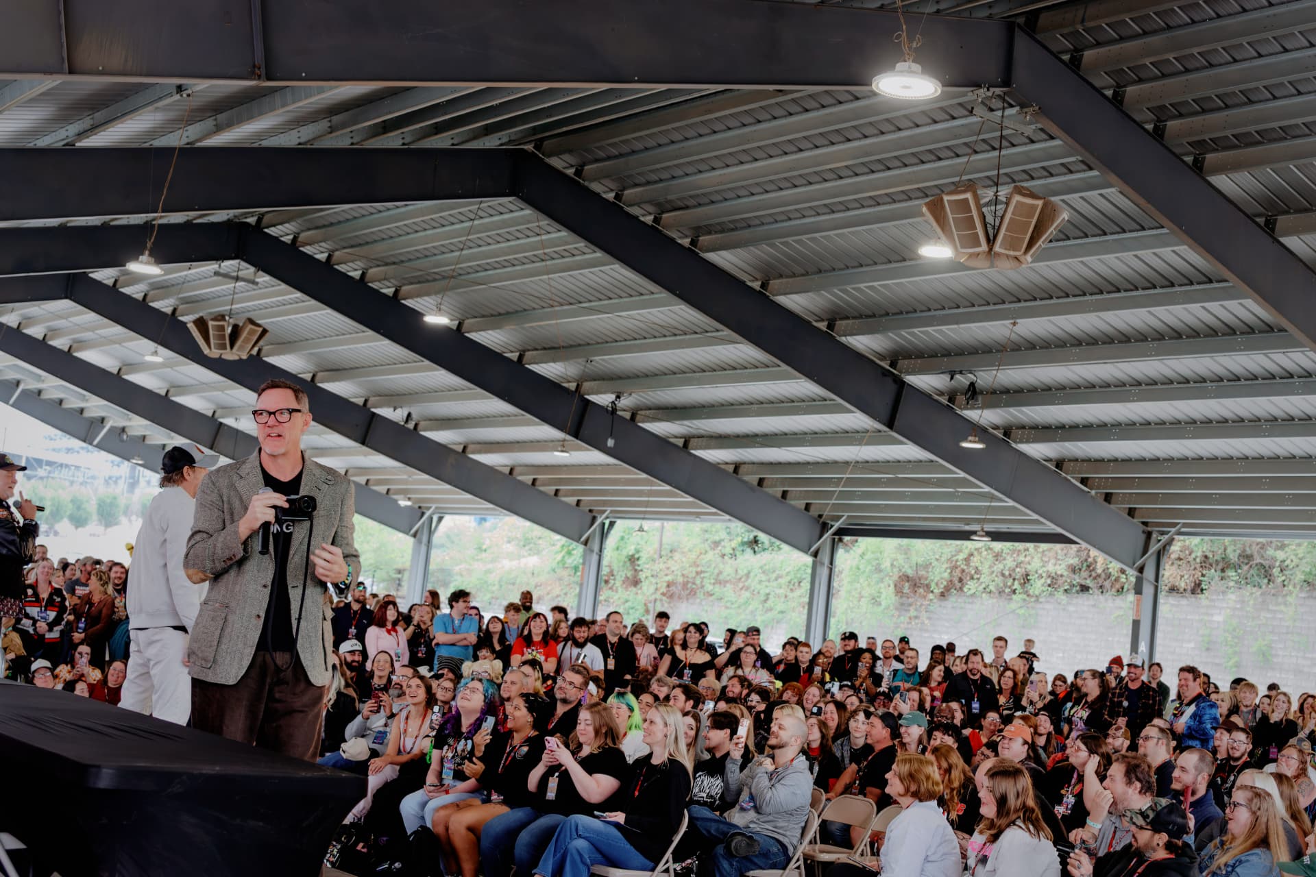 Matthew Lillard speaking to a packed pavilion crowd